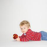 Boy with apple.