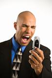 Man yelling at cellphone.