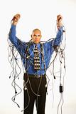 Man wrapped in cables.