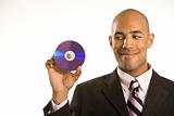 Man holding compact disc.