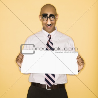 Man holding  blank sign.