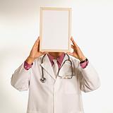 Doctor holding blank sign.