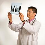 Doctor examining x-ray.