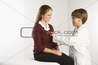 Doctor examining patient.