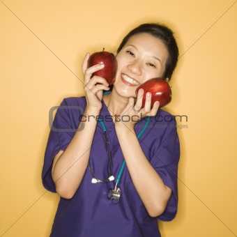 Doctor and apples.