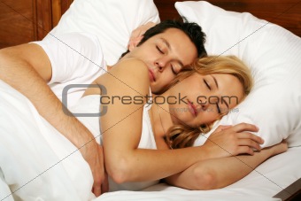sleeping young couple