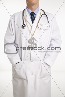 Doctor wearing dollar sign.
