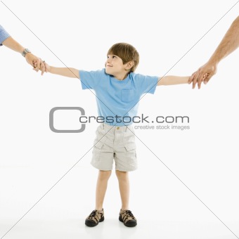 Boy with parents.
