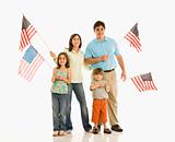 Family holding American flags.