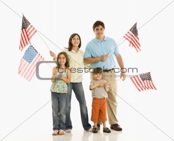 Family holding American flags.