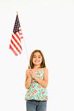 Girl holding American flag.