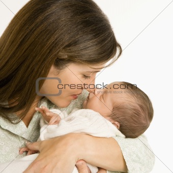 Mother holding baby.