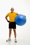 Man holding exercise ball.