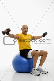 Man using exercise ball.