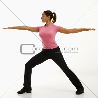 Woman practicing yoga.