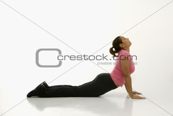 Woman practicing yoga.