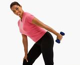 Woman exercising with dumbbell.