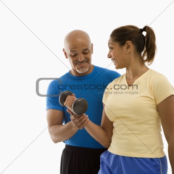 Woman and man exercising.