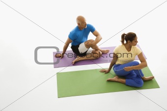 Man and woman stretching.