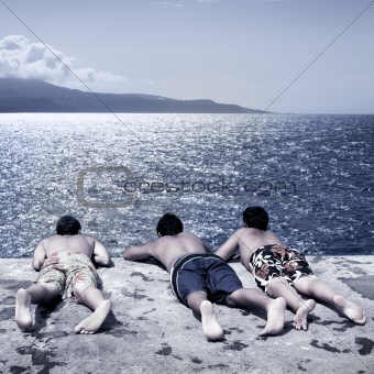 Boys looking at the sea
