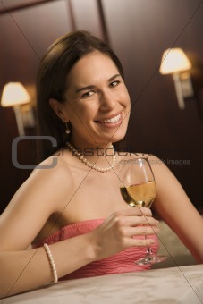 Woman drinking wine.