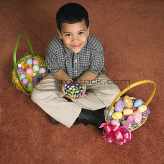 Boy with Easter baskets.