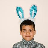 Boy wearing bunny ears.