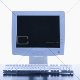 Computer monitor and keyboard.