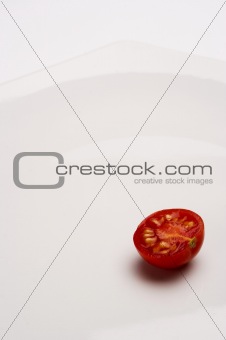 Tomato in white plate