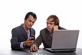 two businessman with laptop