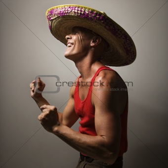 Dancing man wearing sombrero.