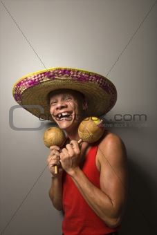 Man with sombrero and maracas.