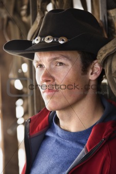 Man wearing cowboy hat.