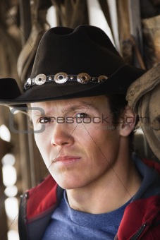 Man wearing cowboy hat.