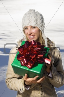 Woman holding present.