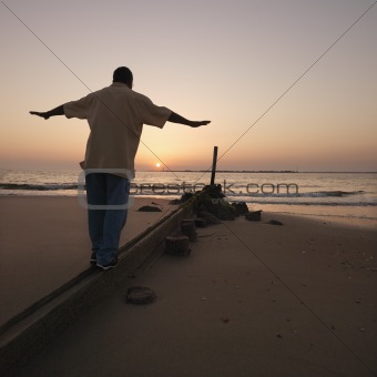 Man on sand barrier