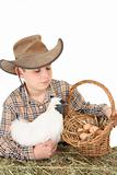 Farm boy with basket of eggs