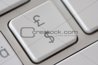British pound and american dollar symbol on keyboard