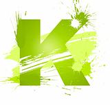 Green abstract paint splashes font. Letter K