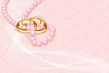 Wedding rings on pink   