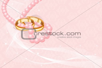Wedding rings on pink   