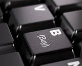 Buy key on a keyboard, on-line shopping concept image
