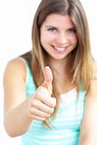 Positive woman with her thumb up to the camera