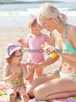 Happy young family at the beach