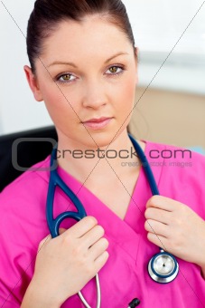 Sophisticated female surgeon looking at the camera