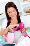 Delighted woman with shopping bags