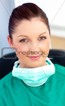 Portrait of a smiling surgeon in her office
