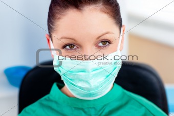 Portrait of a serious surgeon with mask