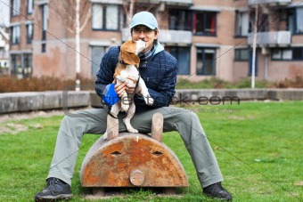 Man playing with dog