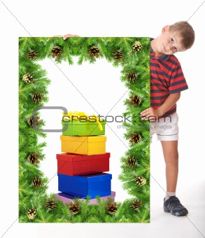 Boy  holding a christmas banner